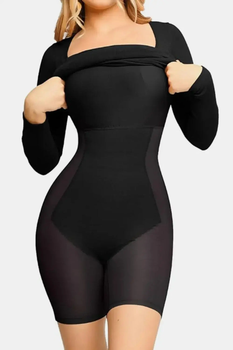 Black stretch long-sleeve figure-hugging dress with square neckline and sheer details, highlighting the silhouette elegantly.