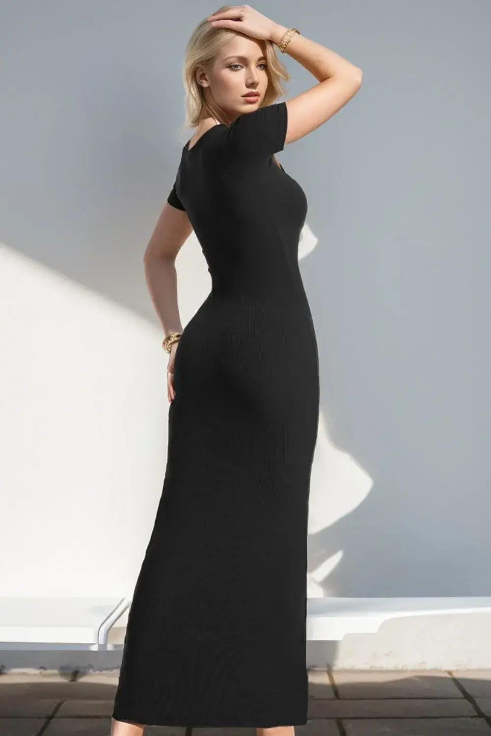 Woman wearing Basic Bae shapewear maxi dress with short sleeves and square neckline, styled for both casual and formal occasions.