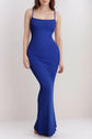 Woman wearing blue shaper sleeveless maxi dress with built-in shapewear and seamless fit.